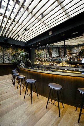 Bar area at Hermosos y Malditos restaurant in Madrid