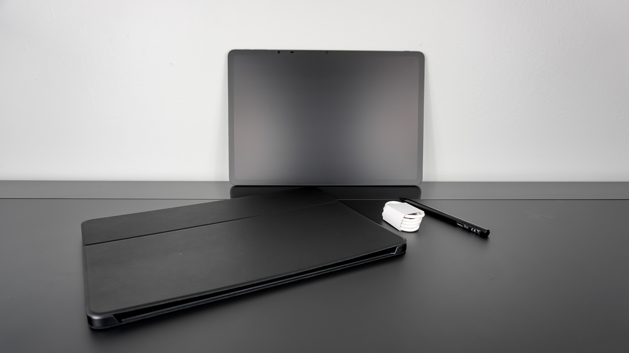 The TCL NXTPAPER 14 unboxed on a desk