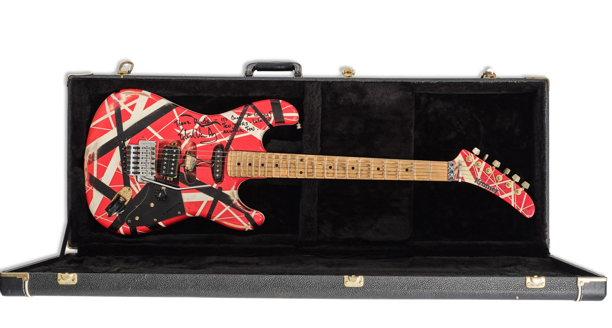 Eddie Van Halen&#039;s 1982 Kramer: finished in red, black and white stripes, this was a an early Kramer design that was later owned by Mick Mars.