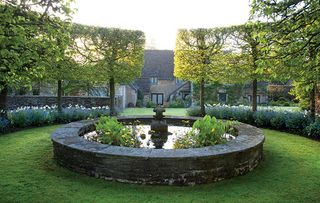 Cotswolds House garden with fountain