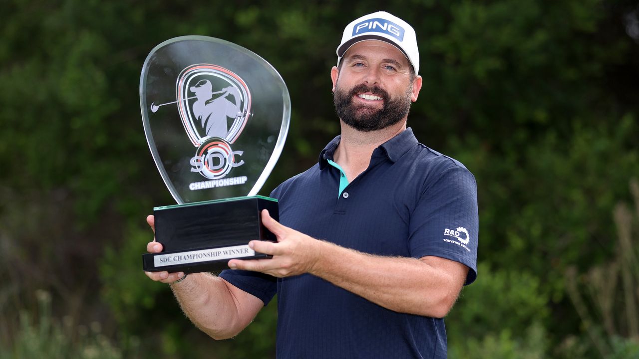 Matthew Baldwin with the SDC Championship trophy