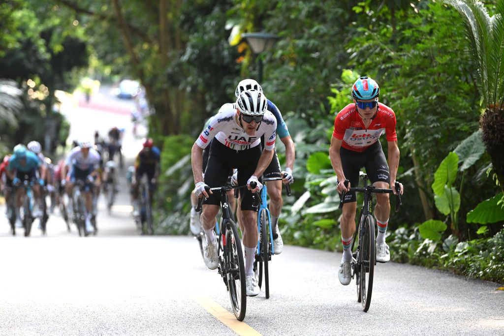 NANNING CHINA OCTOBER 20 LR Pavel Sivakov of Russia and UAE Team Emirates and Lennert Van Eetvelt of Belgium and Team Lotto Dstny Red Leader Jersey attack during the 5th GreeTour of Guangxi 2024 Stage 6 a 134km stage from Nanning to Nanning UCIWT on October 20 2024 in Nanning China Photo by Dario BelingheriGetty Images