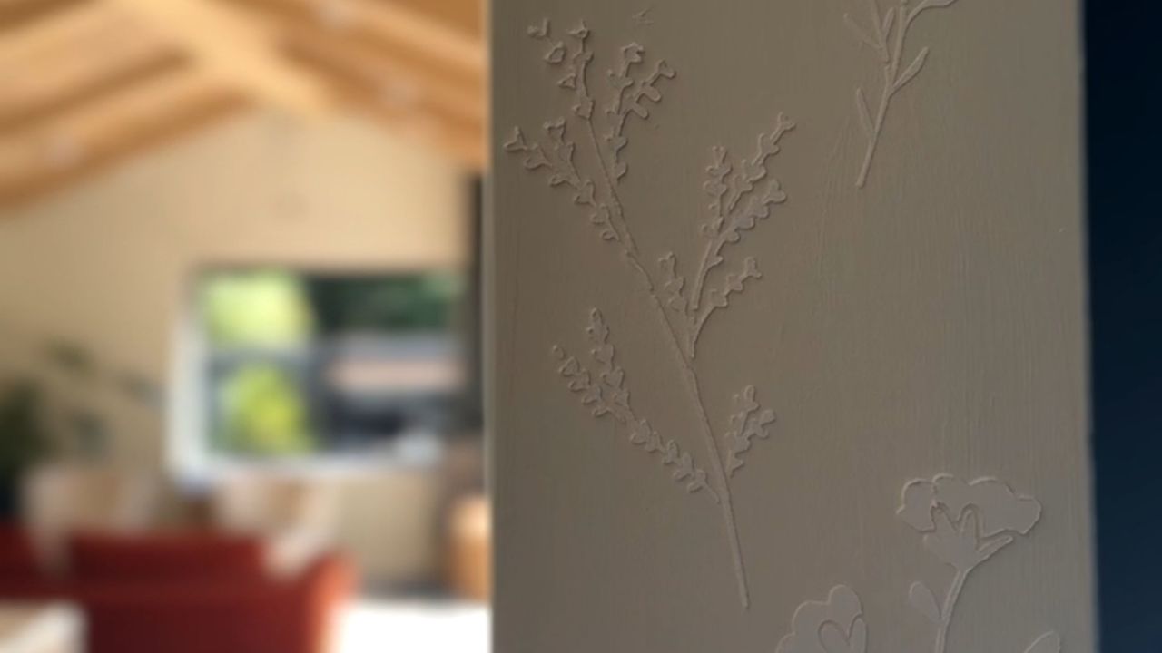 Floral 3D stencils on an entrance to a room