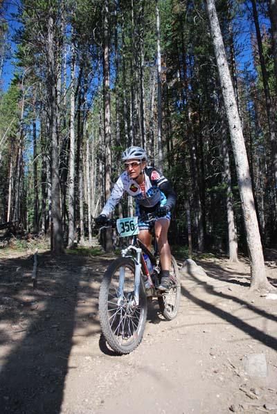 Cheryl Sornson (Team CF) races through the trees