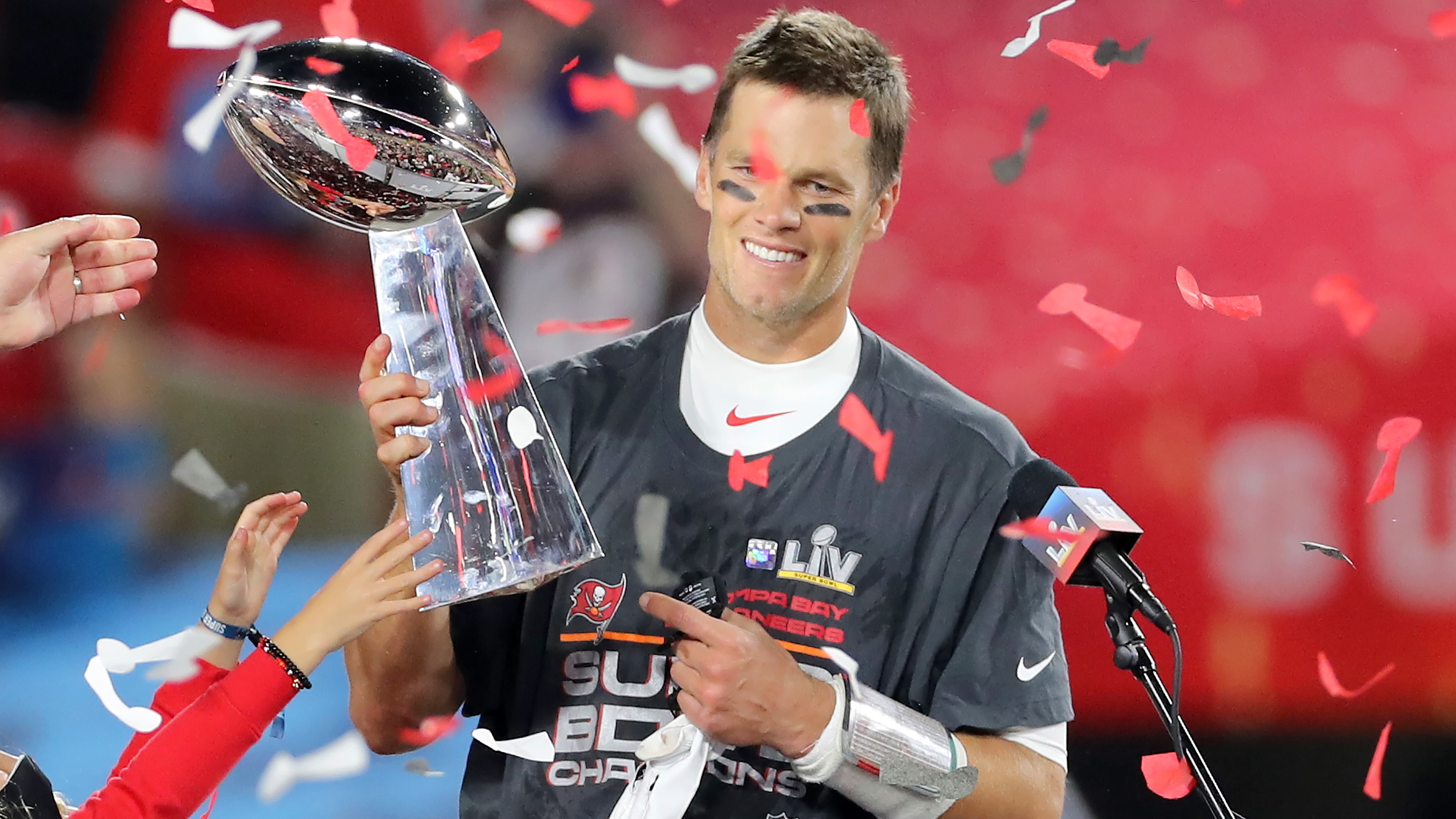 Tom Brady of the Tampa Bay Buccaneers with the Super Bowl trophy