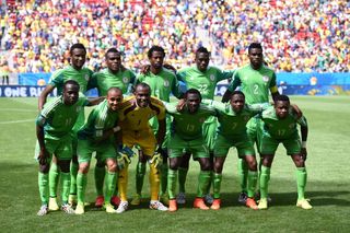 The Nigeria team line up for a photo ahead of their 2014 World Cup last 16 match against France in Brazil