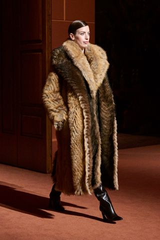 Milan fashion week AW25 trend mob wife faux fur coats