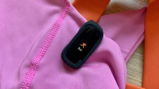 The Fitbit Inspire 3 in the exercise clip attached to clothing