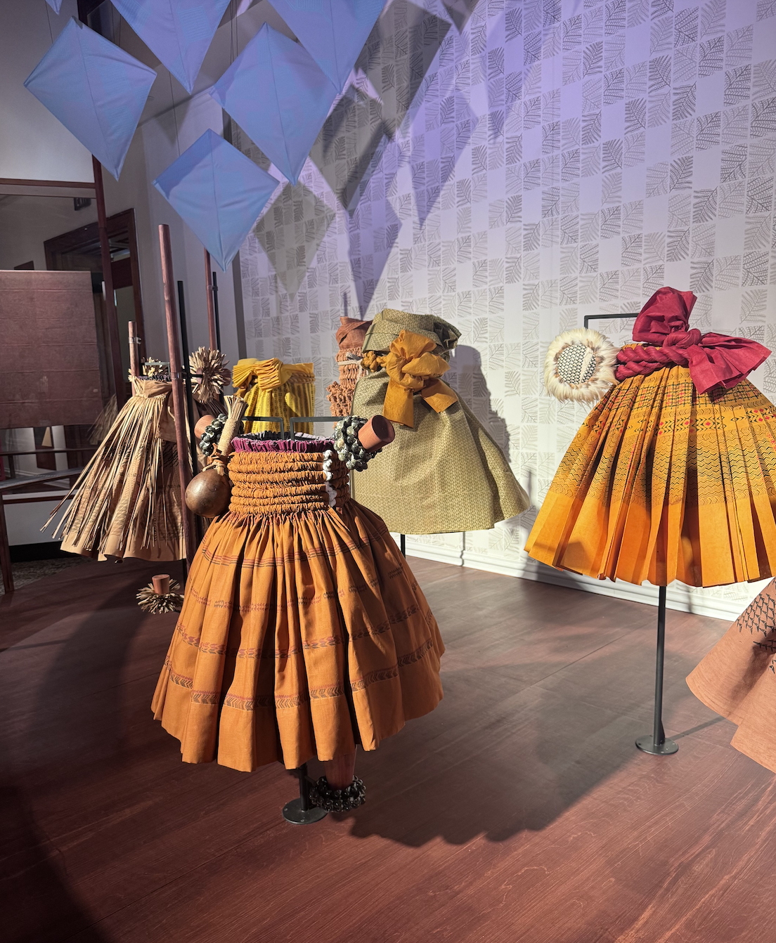 Traditional Hawaiian costumes on a display at the Bishop Museum
