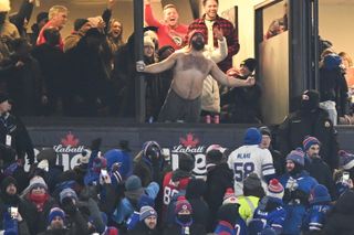 Jason Kelce celebrates after the Kansas City Chiefs score a touchdown during the first half of the AFC Divisional Playoff game against the Buffalo Bills at Highmark Stadium on January 21, 2024 in Orchard Park, New York.