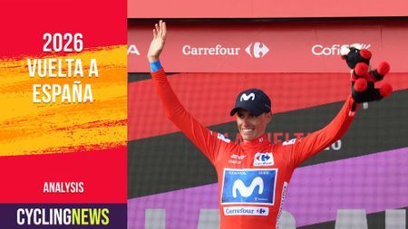 Enric Mas on the podium with Cyclingnews banner overlay