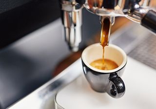 Espresso machine pouring coffee.