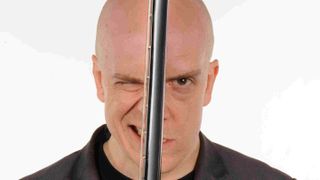 Devin Townsend posing for a photograph in 2011