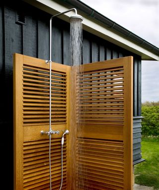 outdoor shower with wooden enclosure