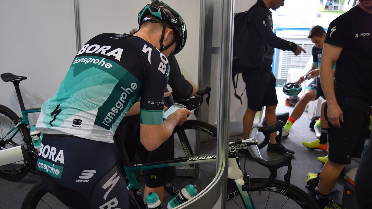 Sam Bennett pairs the power meter with his iPhone ahead of a training ride