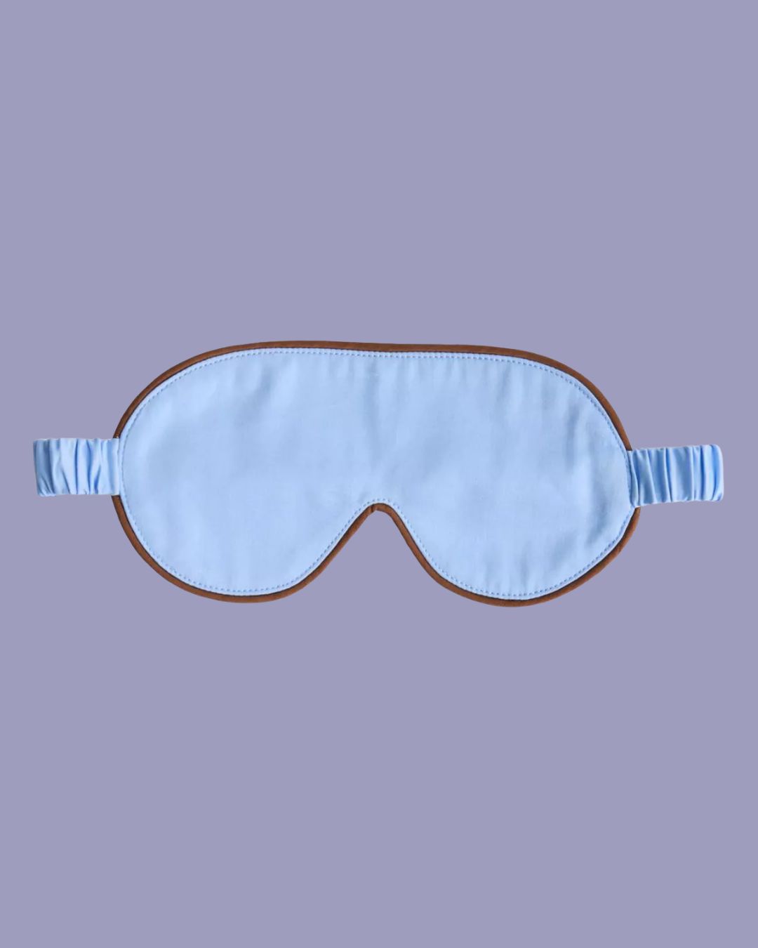 HAY Outline Cotton Sleep Mask in Milk Chocolate against pale lilac background.