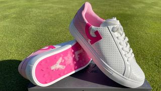 G/Fore PERF DSRPT Shoe and its vibrant pink sole plate and heel