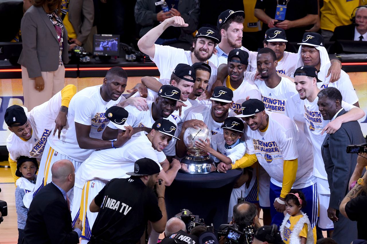 The Golden State Warriors celebrate their win over the Houston Rockets on May 27, 2015