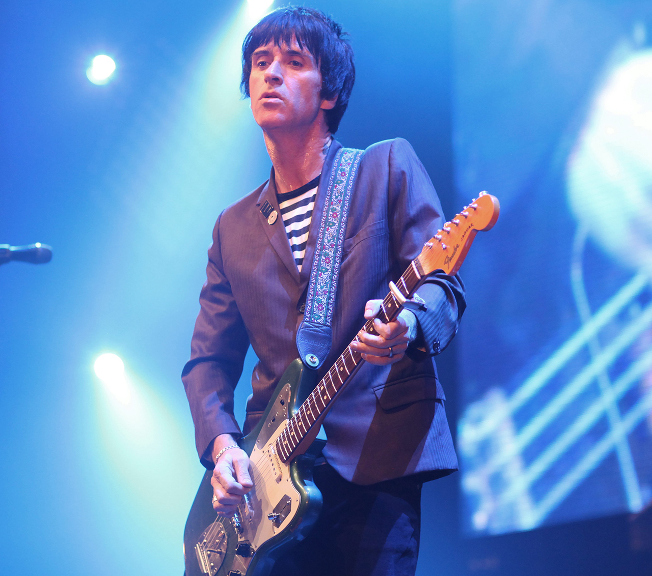 Johnny Marr performs on stage at City Live, Manchester City Football Club's Season Launch Party, at Manchester Central on 14th August 2014