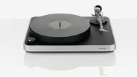 The Clearaudio Concept record player on a white, reflective background