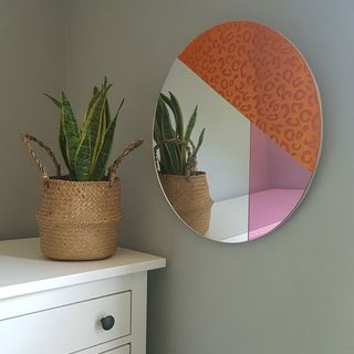 room with grey wall and mirror