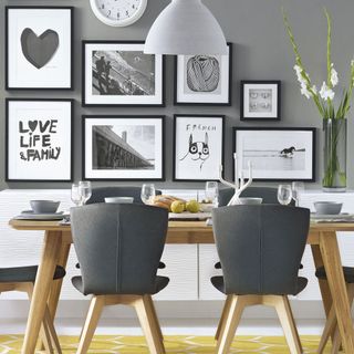 grey dining room with wood dining table pale wood dining furniture with smart grey upholstery and zingy yellow rug