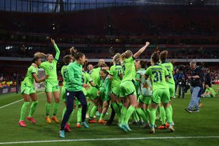 Wolfsburg celebrate a last-minute win against Arsenal in the Women's Champions League