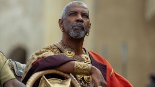 Denzel Washington looks up stoically in Gladiator II.