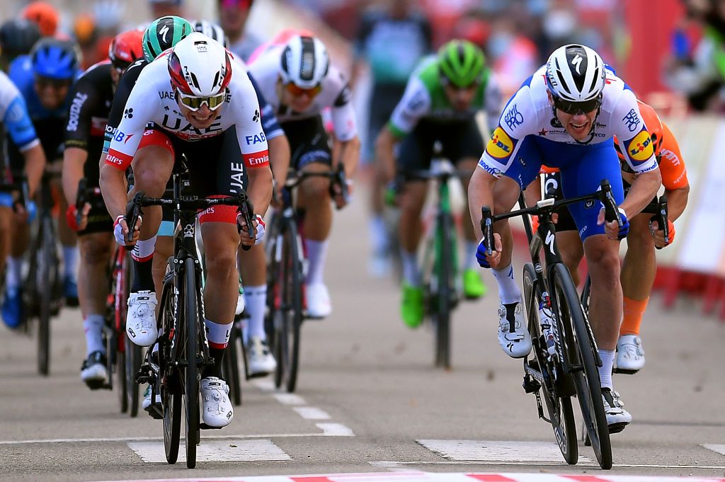 EJEADELOSCABALLEROS SPAIN OCTOBER 23 Sprint Arrival Sam Bennett of Ireland and Team Deceuninck QuickStep Jasper Philipsen of Belgium and UAE Team Emirates Jakub Mareczko of Italy and CCC Team during the 75th Tour of Spain 2020 Stage 4 a 1917km stage from Garray Numancia to Ejea de los Caballeros lavuelta LaVuelta20 La Vuelta on October 23 2020 in Ejea de los Caballeros Spain Photo by Justin SetterfieldGetty Images