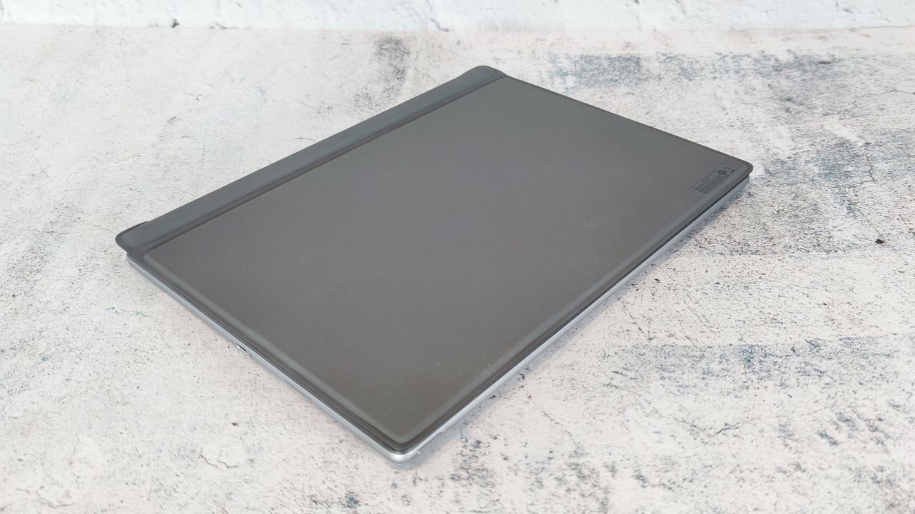 A photograph of the Dell Latitude 7320 with keyboard cover