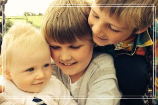 Our writer, Heidi Scrimgeour's three children pictured laughing together in a park