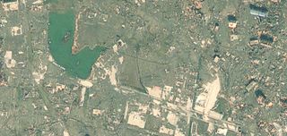 satellite image of damage in Rikuzentakata