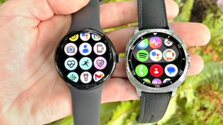 Close up of the Google Pixel Watch 3 XL next to the Samsung Galaxy Watch 8 Classic; both are in a user's hand