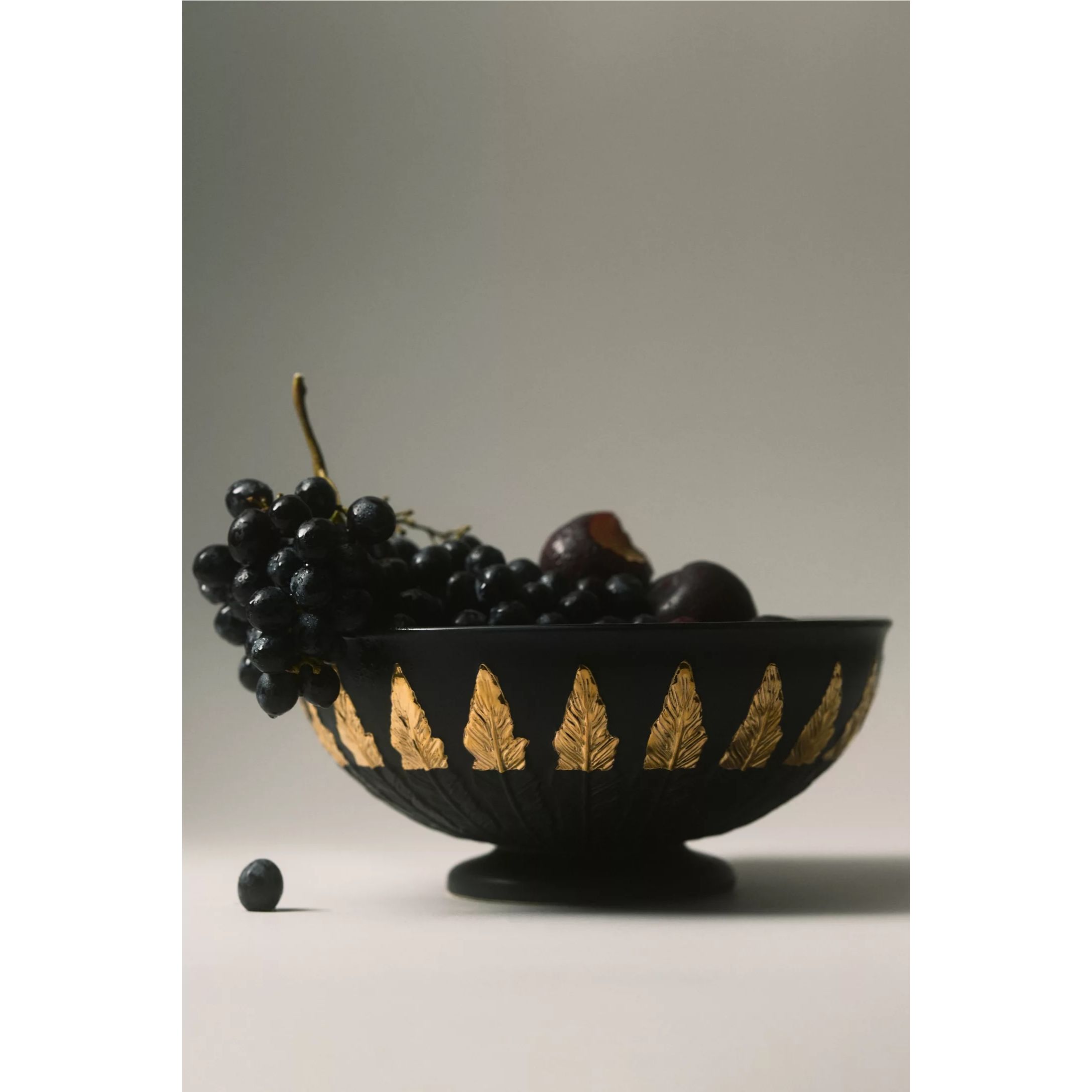 black bowl with gold leaf accents