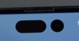 iPhone 14 Pro closeup photo of alleged pill and hole punch shaped cutouts for TrueDepth camera array