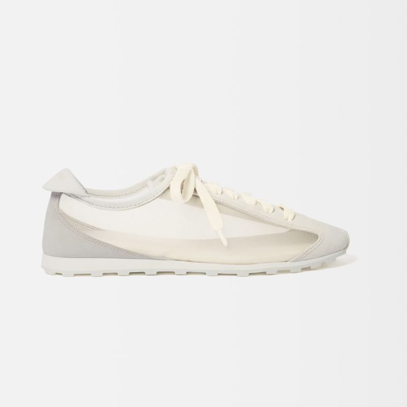 white mesh side trainers