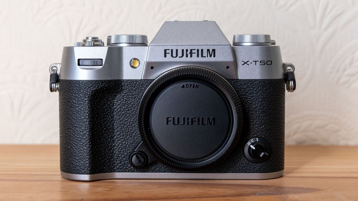 The Fujifilm X-T50 with the protective cap covering the sensor