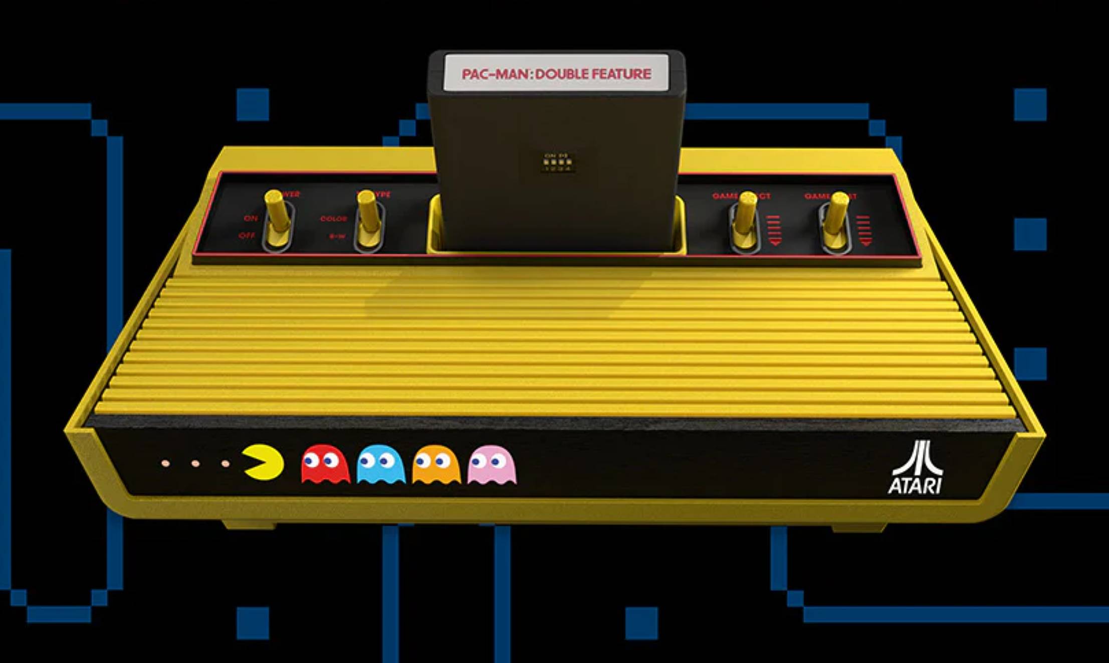 Atari 2600+ Pac-Man edition with double feature cartridge inserted and maze backdrop.
