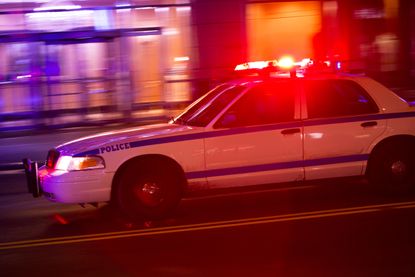 A police car at night.