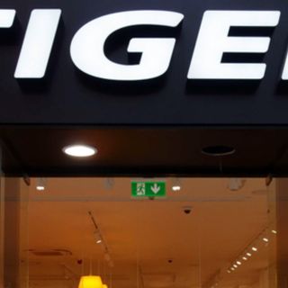 glass walled store with tiger banner