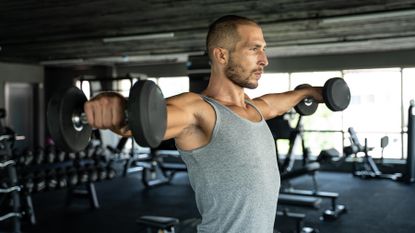 Man doing a dumbbell workout