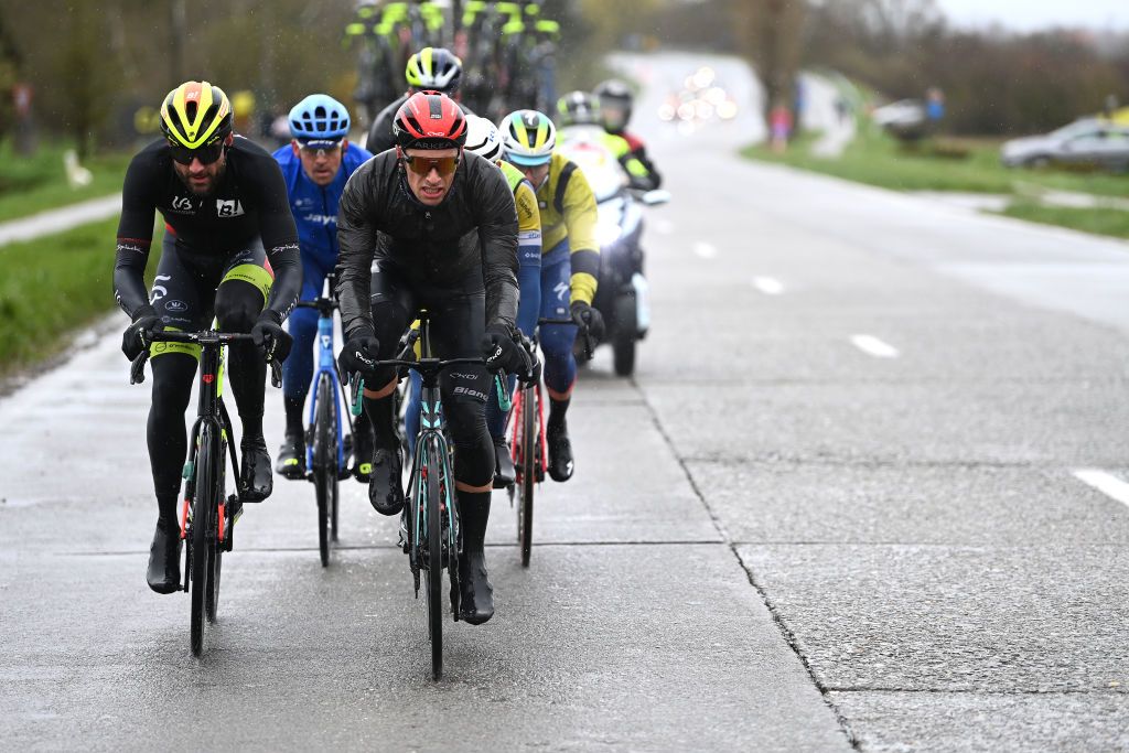 WEVELGEM BELGIUM MARCH 26 LR Guillaume Van Keirsbulck of Belgium and Team Bingoal WB and Jenthe Biermans of Belgium and Team Arka Samsic compete in the chase group during the 85th GentWevelgem in Flanders Fields 2023 Mens Elite a 2609km one day race from Ypres to Wevelgem UCIWT on March 26 2023 in Wevelgem Belgium Photo by Tim de WaeleGetty Images