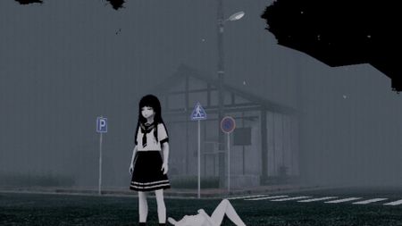 Yumi stands on a foggy street