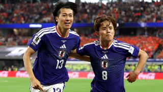 Keito Nakamura #13 of Japan celebrates with Takefusa Kubo #8 after scoring the team's first goal during the FIFA World Cup 2026 Group F match between Netherlands and Japan