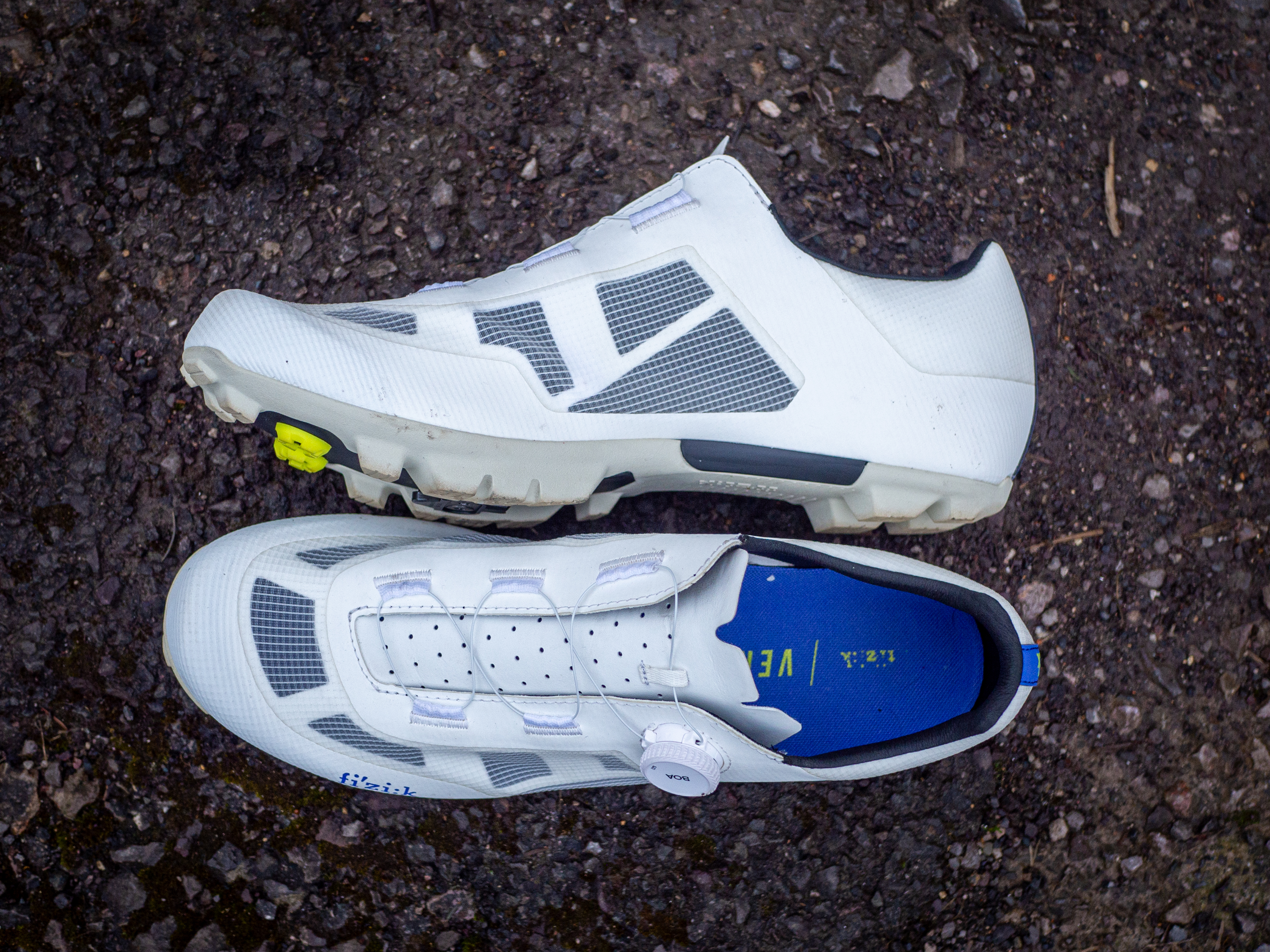 A white pair of Fizik Vento Proxy gravel shoes