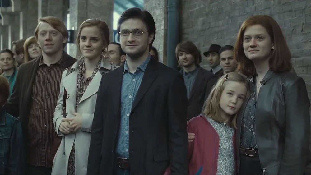 Ron (Rupert Grint), Hermione (Emma Watson), Harry (Daniel Radcliffe) and Ginny (Bonnie Wright) gather at platform 9 and 3/4 to send the next generation of witches and wizards to Hogwarts, in &quot;The Deathly Hallows: Part 2&quot; (Warner Bros. Pictures, 2011).