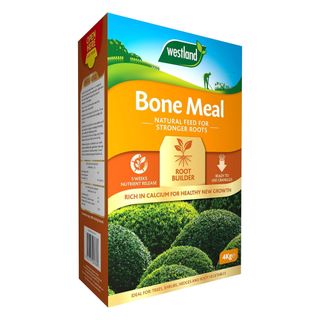 Orange and green box of Westland bone meal with shrubs on the front