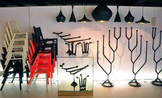 ﻿Tom Dixon: The ’Peg Chair Fluro’ stacks up nicely underneath the ’Bean Stout’ lights.