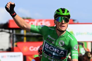 BREDA NETHERLANDS AUGUST 21 Sam Bennett of Ireland and Team Bora Hansgrohe Green Points Jersey celebrates winning during the 77th Tour of Spain 2022 Stage 3 a 1932km stage from Breda to Breda LaVuelta22 WorldTour on August 21 2022 in Breda Netherlands Photo by Tim de WaeleGetty Images