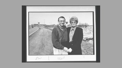 Research chemist/author Lionel Dahmer, father of confessed serial killer Jeffrey Dahmer, w. wife Shari (stepmother) standing outside of Columbia Correctional Institute where Jeffrey is imprisoned.